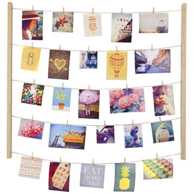 Umbra 315000-390 hangit natural mise en scène photos, 40 clips inclus. 25.98 in x 29.88 in (66 cm x 75.9 cm) État correct - Umbra reconditionné disponible sur Fnac