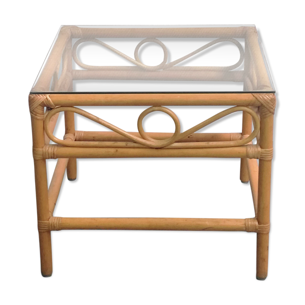 Table basse en rotin et plateau en verre